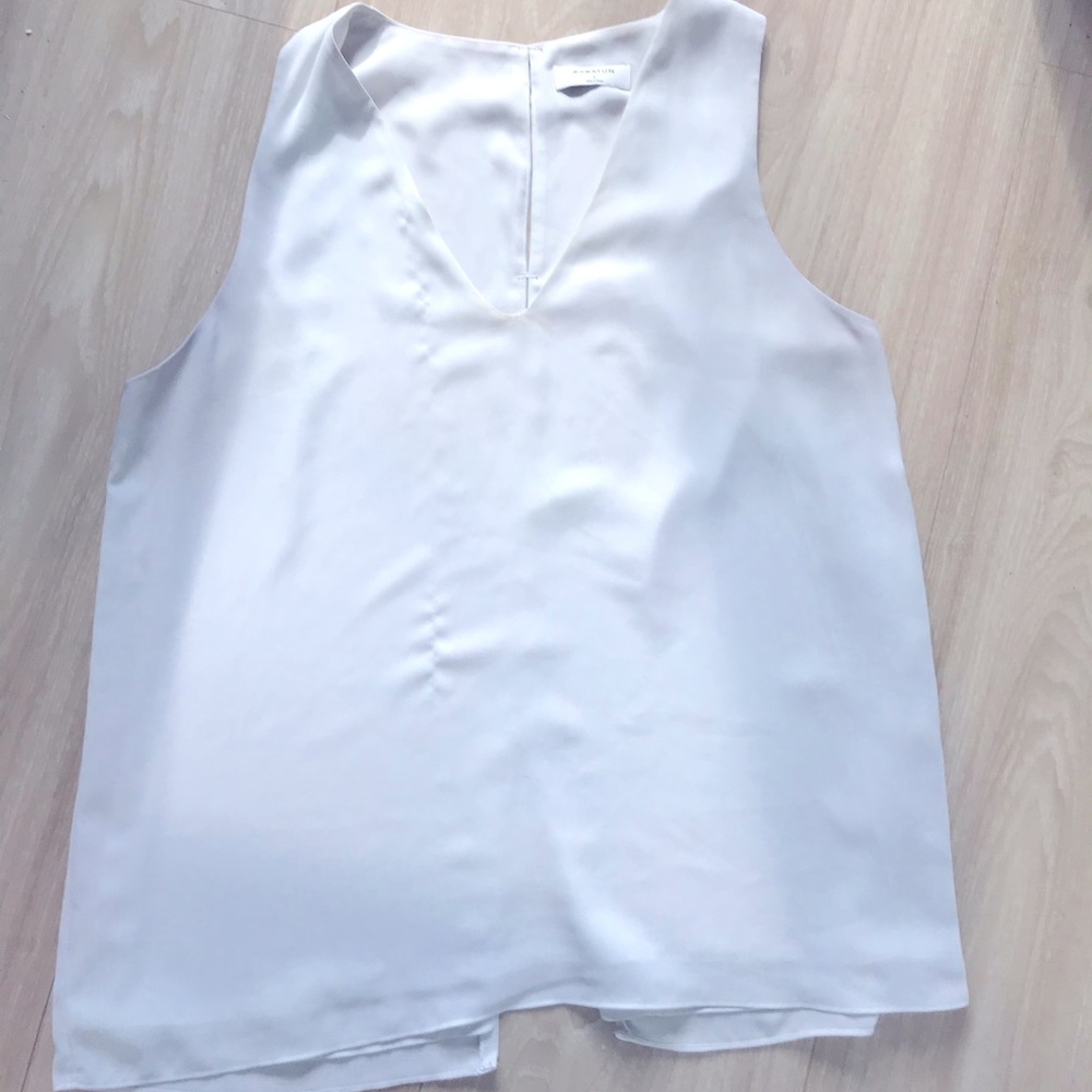 White sleeveless blouse